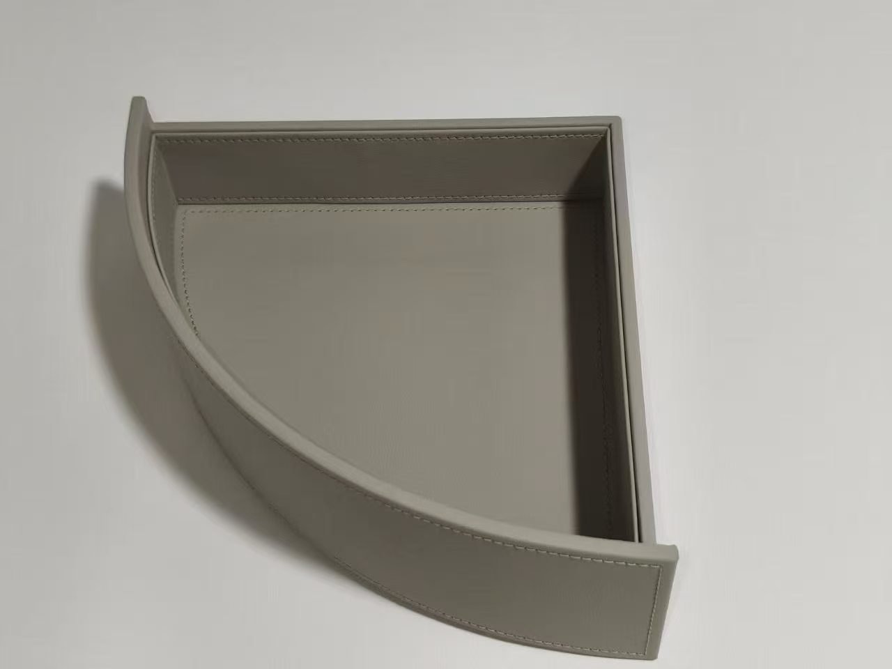 Custom leather drawer inserts for handbag cabinet
