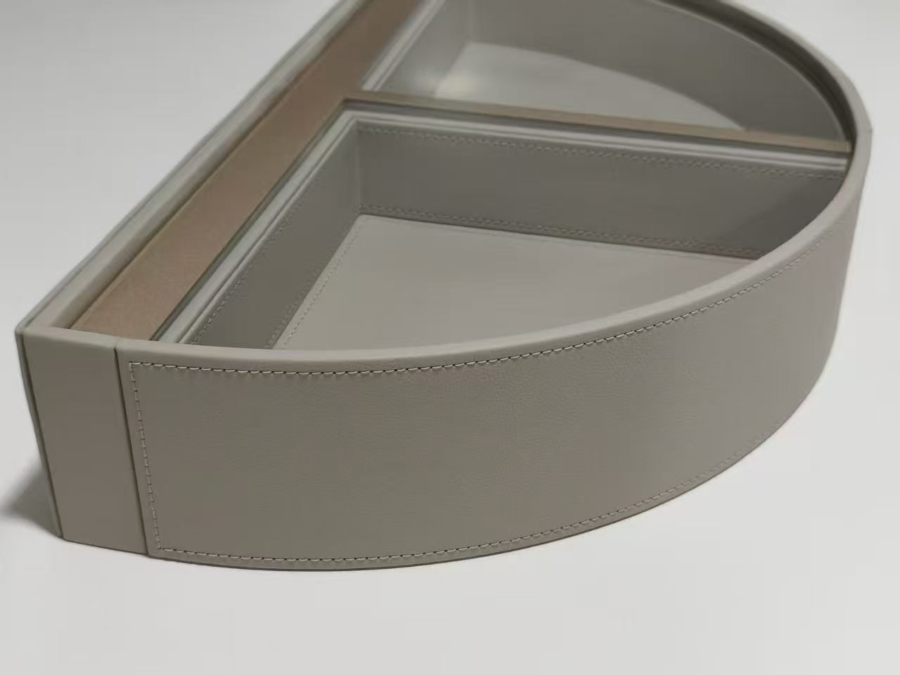 Semicircle leather trays for handbag storage